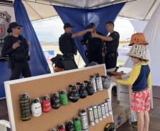 Exposição da Polícia Penal com drones e tecnologia atrai turistas e moradores do Litoral