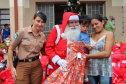 Natal Solidário da PM presenteia mais de 180 crianças com brinquedos, brincadeiras e Papai Noel em Curitiba (PR) 