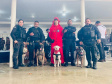 Cães da Polícia Penal são atração do Litoral Cidadão; no centro, Kira do Corpo de Bombeiros.