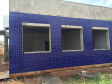 As obras de construção do novo Instituto Médico Legal (IML) de Londrina, no Norte, avançam e já mudam o aspecto estético do prédio. Agora no mês de julho teve início o revestimento com pastilhas das paredes externas da edificação.Foto: Divulgação SEIL