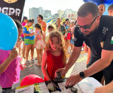 Cães, carros e equipamentos: exposições das polícias chamam atenção de turistas no Litoral