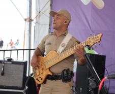 Nem a chuva afasta o público: Banda da PMPR agita o Palco Sunset em Shangri-Lá