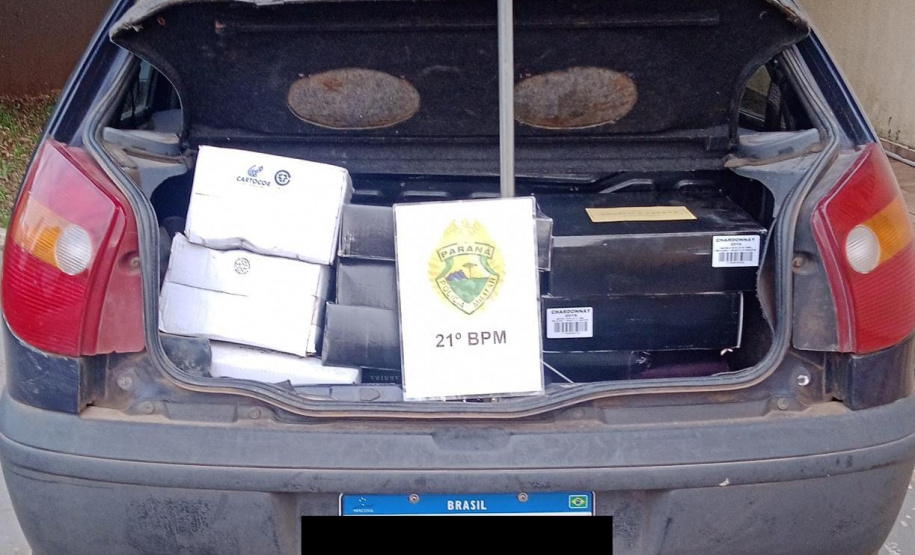 caixas de vinho apreendidas no porta malas do carro do suspeito