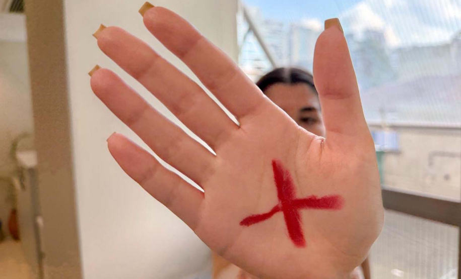 Sinal silencioso que salva vidas integra ação da Segurança Pública no Mês da Mulher